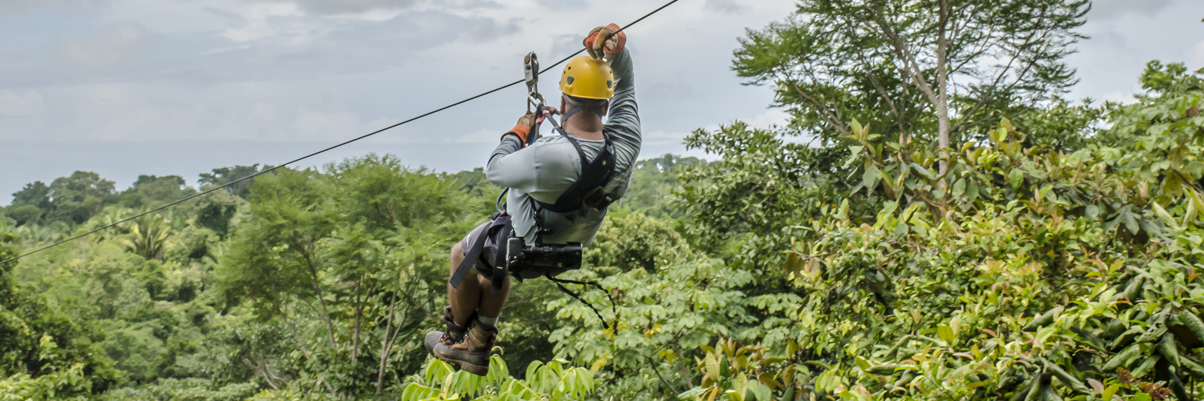 A man ziplining