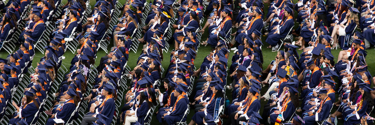 A large group of graduates at commencement