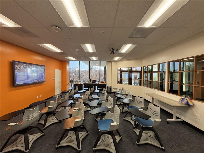 SDC training room with large television on the front wall and 20 chairs
