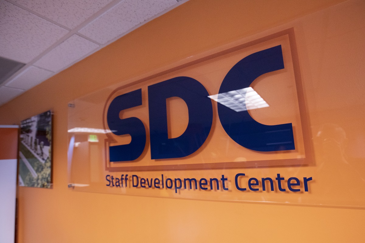 Staff Development Center logo sign